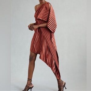 Anthropologie Guapa one-shoulder metallic pleated mini dress in bronze.